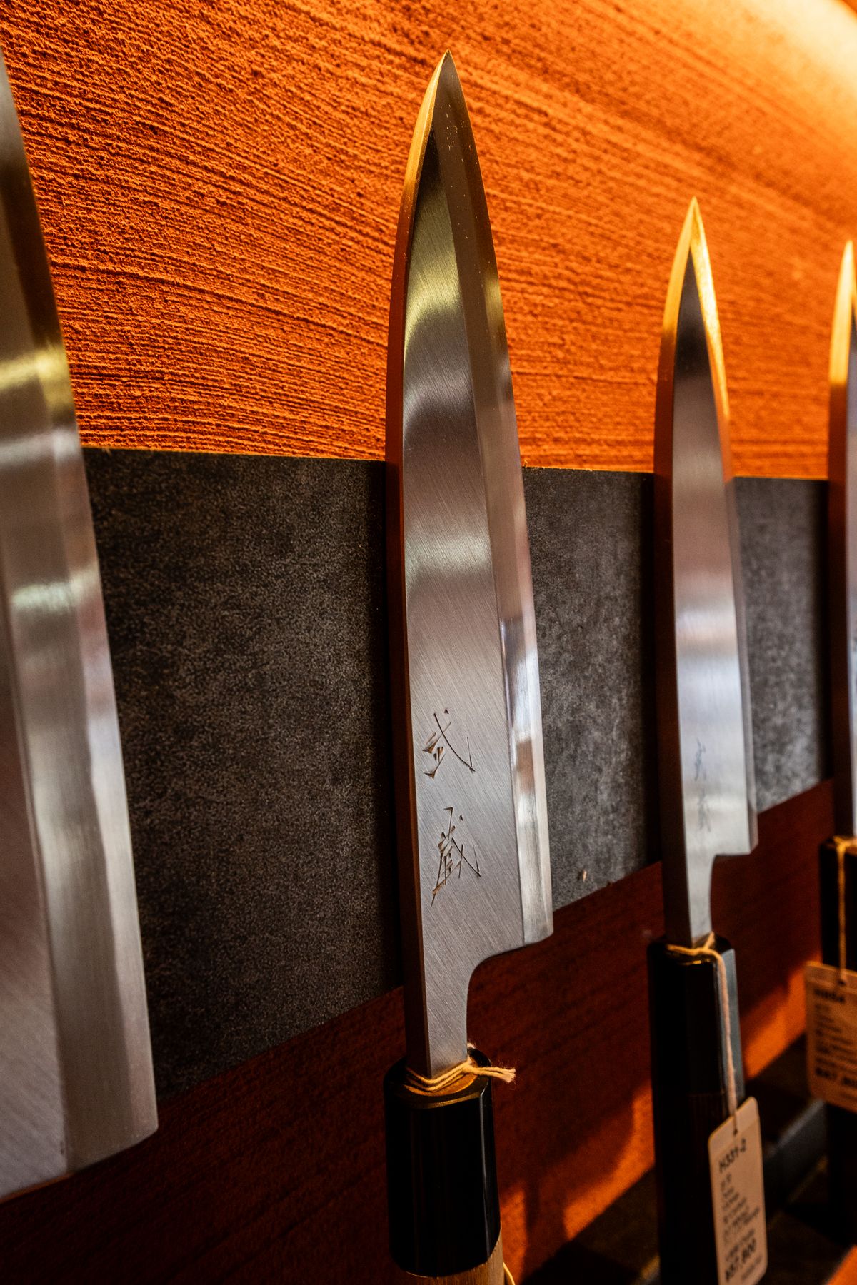Hand-forged Japanese honesuki knife with ike jime tools